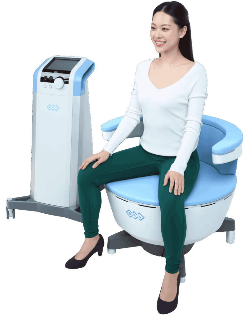 A woman lying on an Emsella treatment chair, with a calm expression